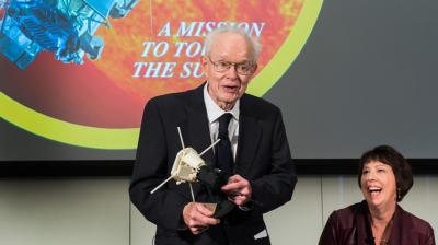 Prof. Emeritus Eugene Parker speaks at NASAs May 2017 announcement of the Parker Solar Probe. The ambitious mission to study the sun will launch in August 2018. <i>Photo by Jean Lachat</i>